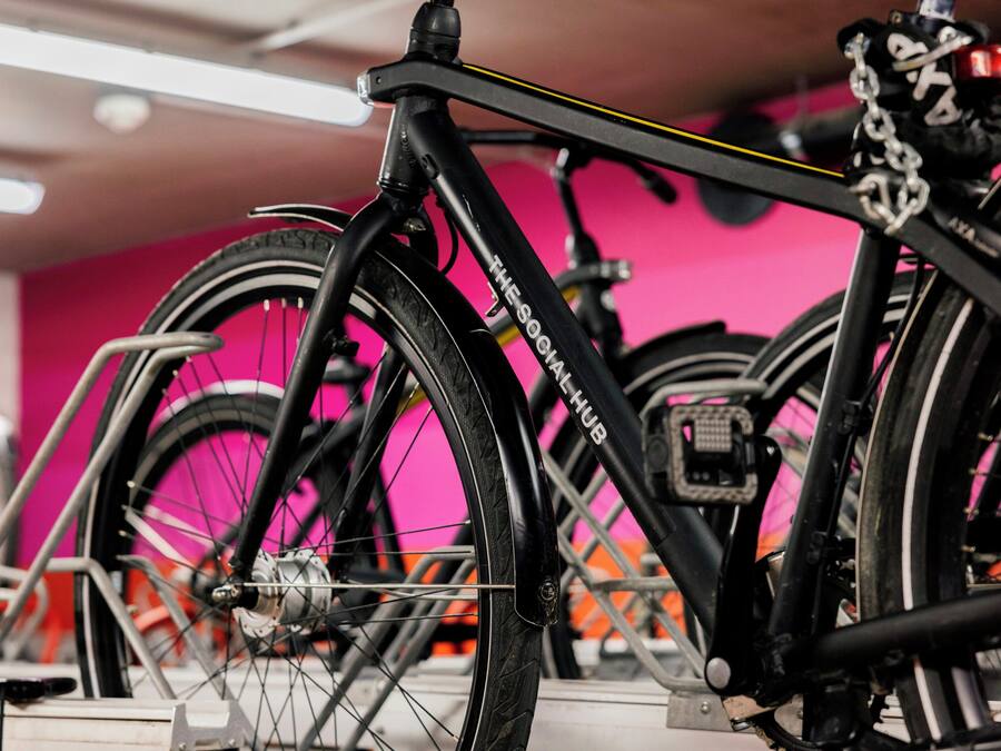 A bicycle with a visible brand name and a QR code on the frame.
