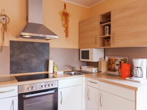 Casa | Cozinha privada | Cadeirão de bebê