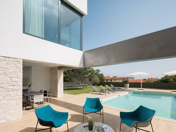 Outdoor pool, sun loungers