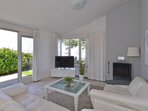Ferienhaus | Wohnzimmer | Kamin