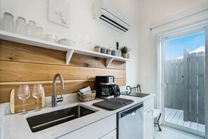 Coffee/tea maker, fridge, stovetop, dishwasher