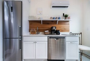 Coffee/tea maker, fridge, stovetop, dishwasher