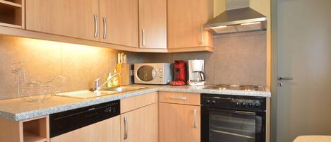 Huis | Privékeuken | Een kookplaat, een kinderstoel