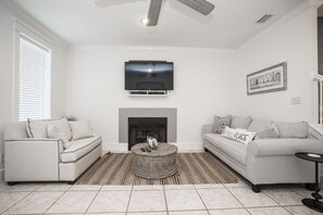House, 4 Bedrooms, Pool Access | Living area | 55-inch LED TV with cable channels, TV - Sunnyside Up by Panhandle Getaways (Panama City Beach)