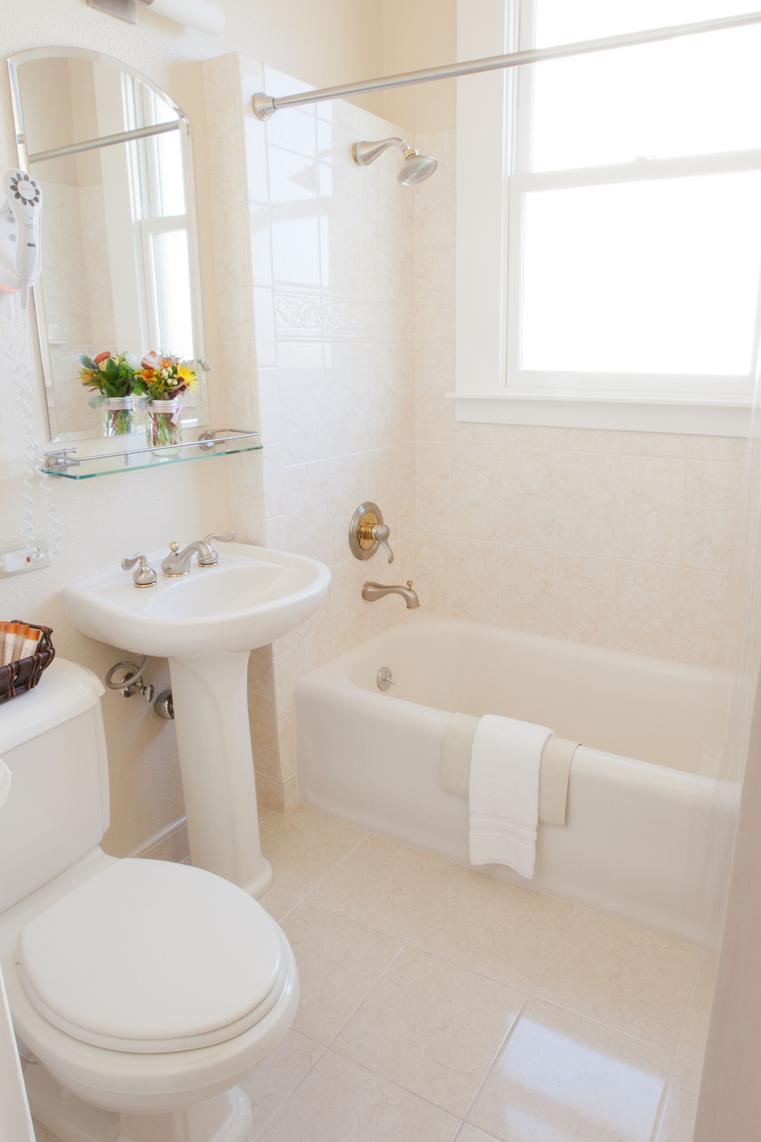 designer toiletries, hair dryer, dressing gowns, slippers