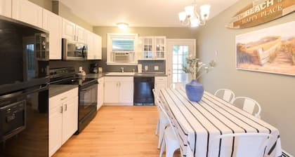 Family-friendly fun; fantastic outdoor seating and deck area with gas grill, outdoor showers