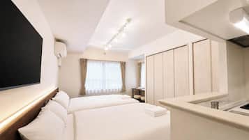 Habitación con 2 camas individuales | Tabla de planchar con plancha y wifi gratis