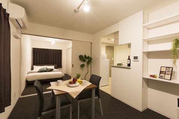 Lägenhet Deluxe | Vardagsrum | Tv