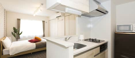 Apartment | Private kitchen | Fridge, microwave, stovetop, electric kettle