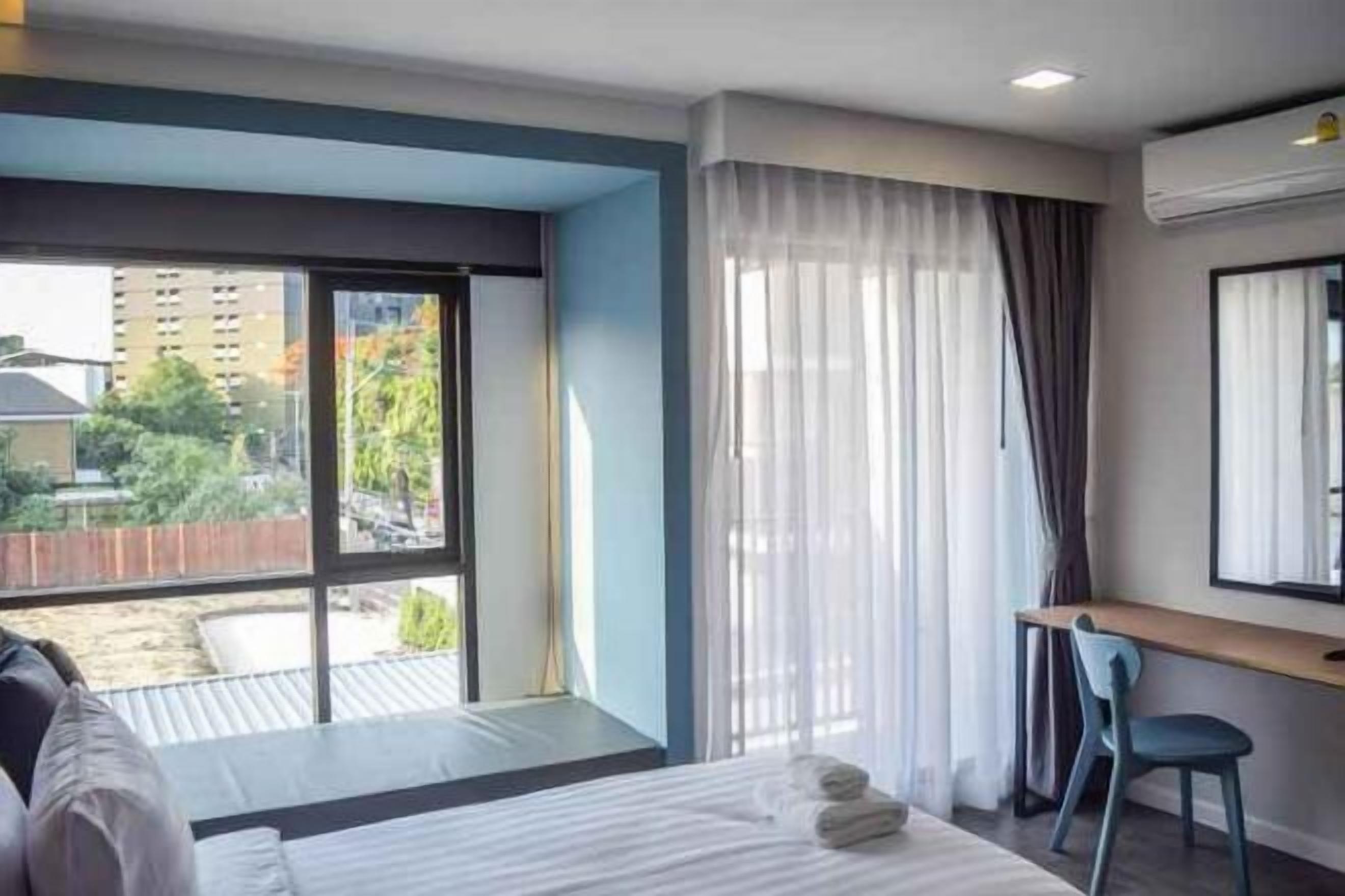 Desk, laptop workspace, free WiFi, bed sheets