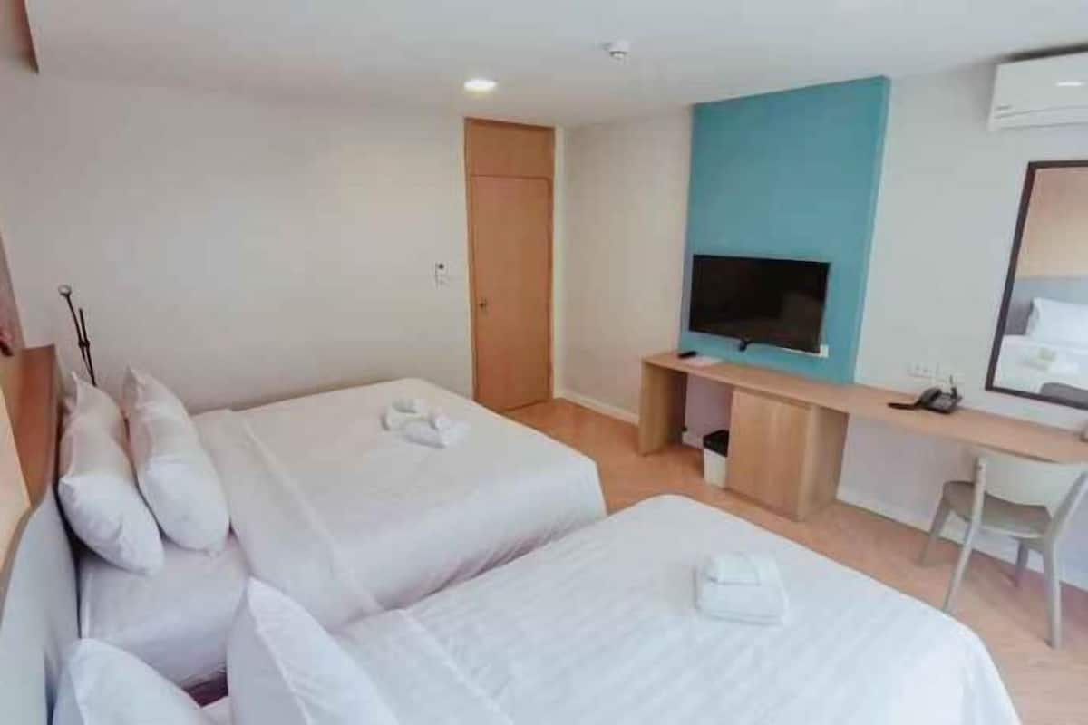 Desk, laptop workspace, free WiFi, bed sheets