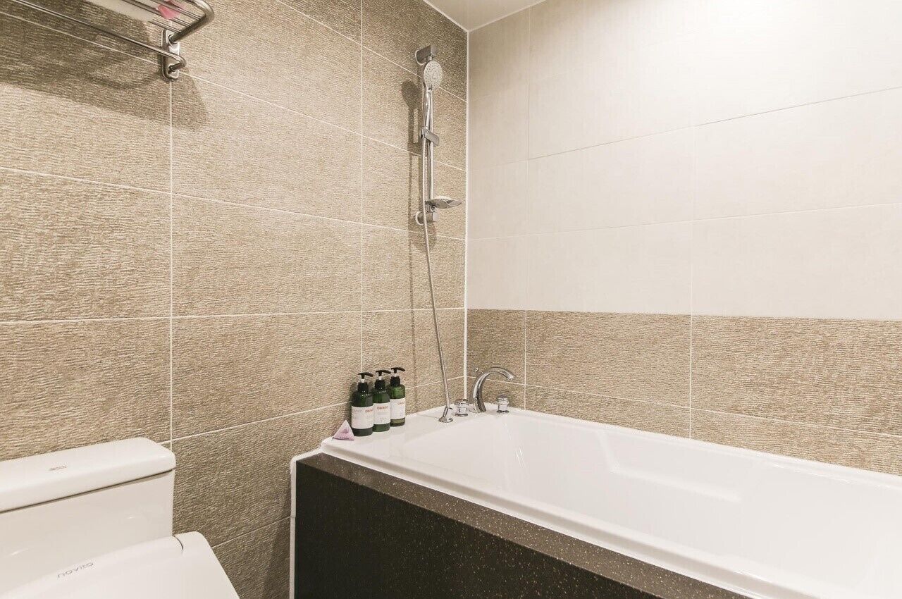 suite | bathroom | rainfall showerhead, free toiletries, hair dryer, electronic bidet