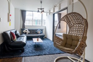 Room301 | Living area | Flat-screen TV