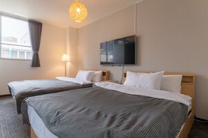 Room301 | Down comforters, desk, laptop workspace, free cribs/infant beds