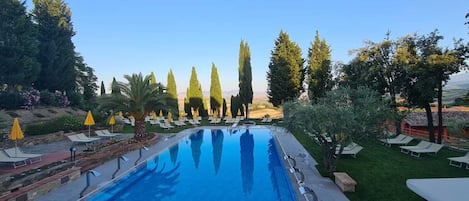 Seasonal outdoor pool, pool umbrellas, sun loungers