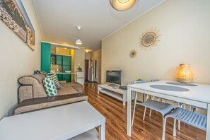 Apartamento | Área de estar | TV de tela plana