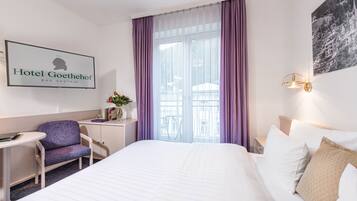 Double Room | Hypo-allergenic bedding, down comforters, desk, blackout drapes