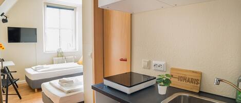 Habitación Confort con 2 camas individuales | Escritorio, wifi gratis y ropa de cama