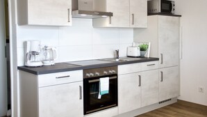 Executive Studio | Private kitchen | Coffee/tea maker, fridge, microwave, oven - Herzog Wolfgang Studios (Zweibruecken)