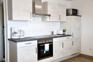 Studio Exécutif | Cuisine privée | Réfrigérateur, micro-ondes, four, plaque de cuisson