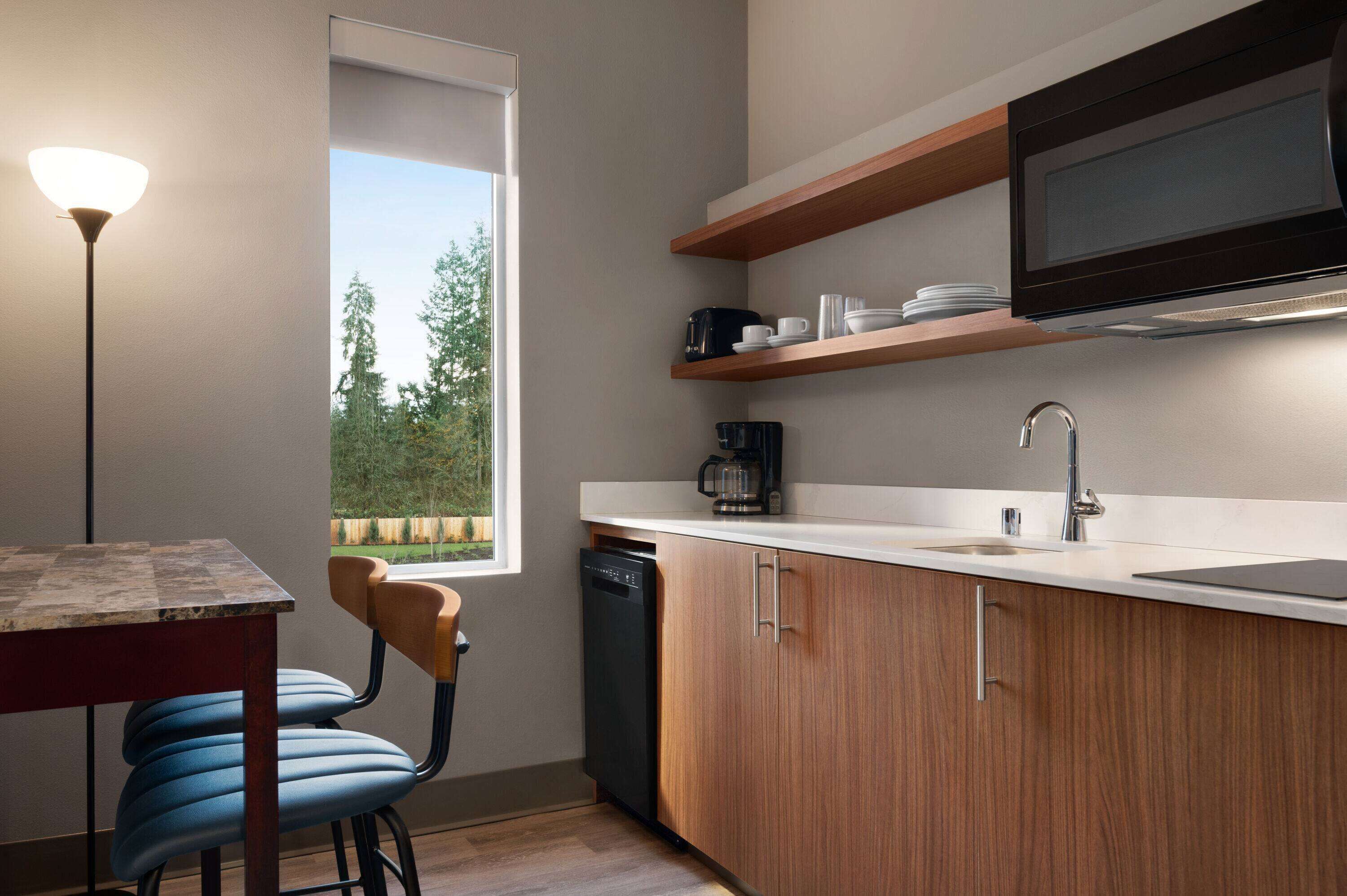 suite, 1 bedroom, non smoking (efficiency) | blackout curtains, iron/ironing board, free wifi, bed sheets