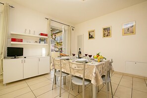 Family Apartment, Multiple Bedrooms (Torbole Relax, Pool & Balcony) | Dining - Torbole Relax, Pool & Balcony Apartment (Nago-Torbole)