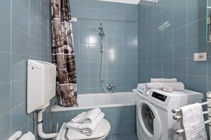 Family Apartment, Multiple Bedrooms, Lakeside (Lake View Historical Center Apartment) | Bathroom | Combined shower/bathtub, rainfall showerhead, hair dryer, bidet - Lake View Historical Center Apartment (Riva del Garda)