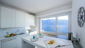 Family Apartment, Multiple Bedrooms (Bellevue apartment) | Private kitchen | Full-sized fridge, microwave, oven, stovetop