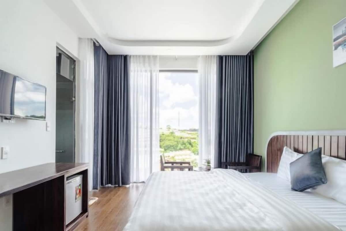 Premium bedding, pillow-top beds, minibar, desk