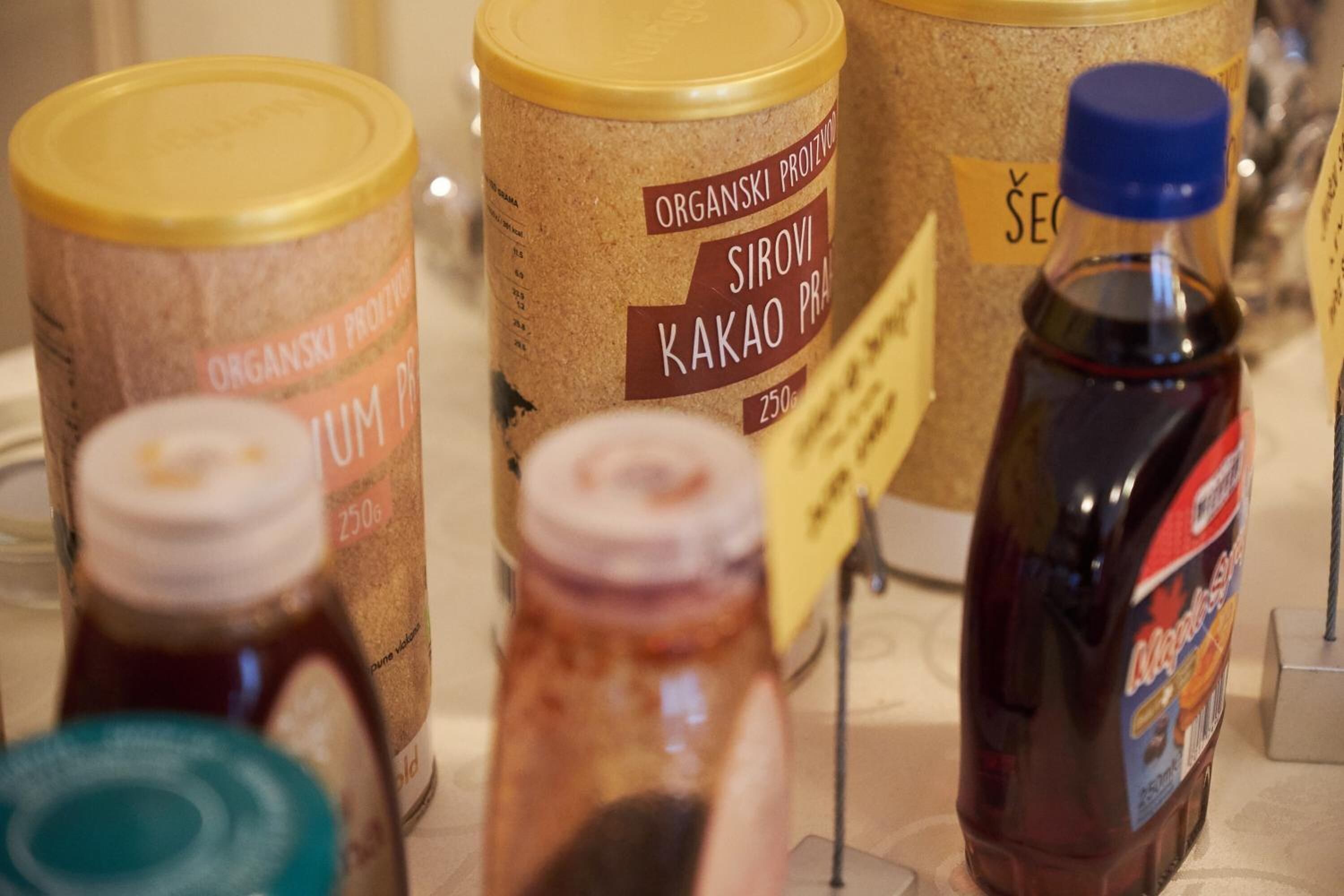 Jars of preserved food items on display.