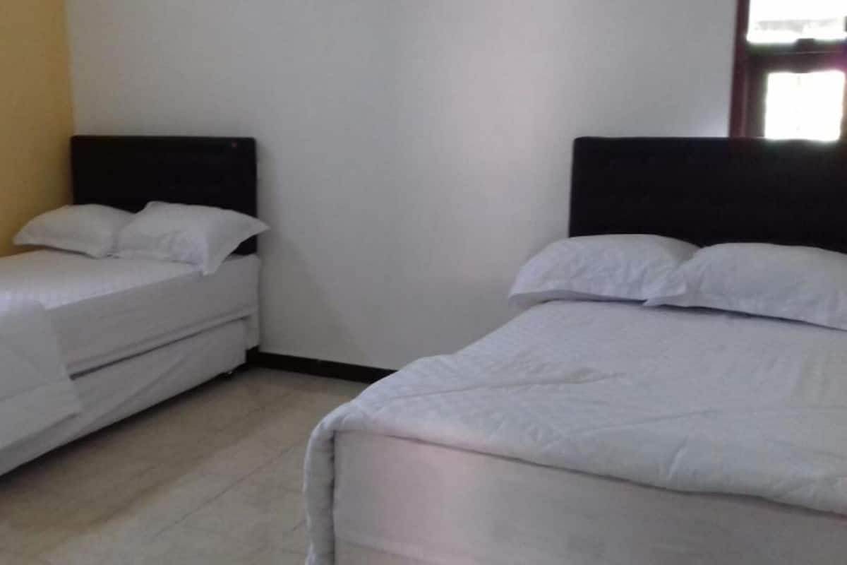 Desk, laptop workspace, free WiFi, bed sheets