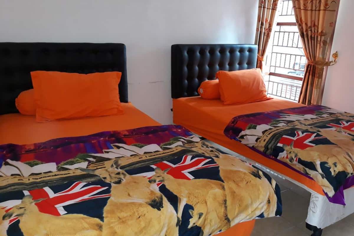 Desk, laptop workspace, free WiFi, bed sheets