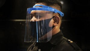 A person wearing a blue face shield. - Arnymas Homestay Syariah (Bantul)