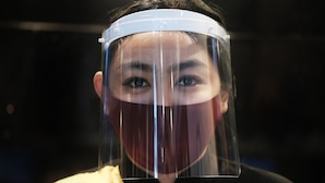 A person wearing a face shield. - Natural Stone Homestay Syariah - Hostel (Bantul)