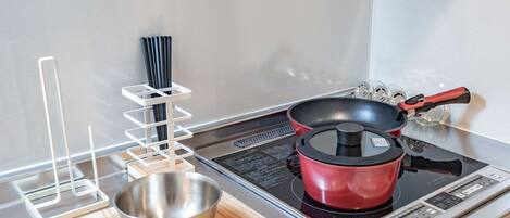 Fridge, microwave, stovetop, cookware/dishes/utensils