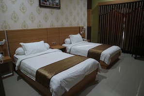 Kamar Deluks | Tempat tidur lipat/tambahan, Wi-Fi gratis, dan seprai linen