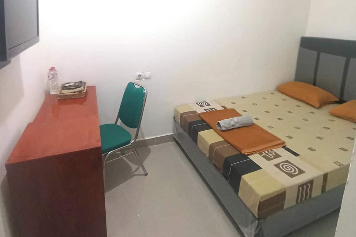 Habitación superior | Escritorio, wifi gratis y ropa de cama