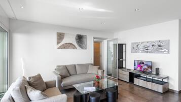 22-inch flat-screen TV with cable channels, TV