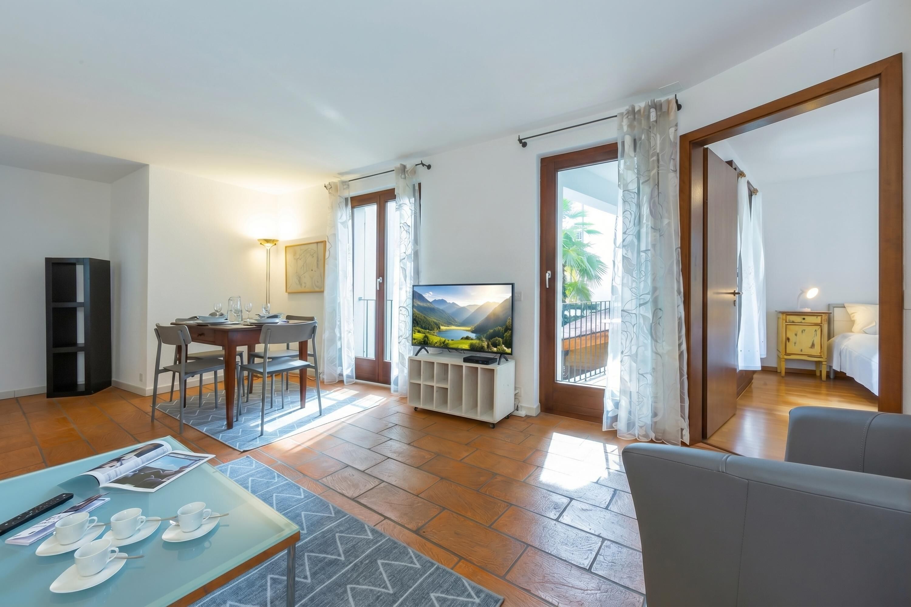 Family Apartment, Multiple Bedrooms (Casa Chiara) | Living area | 22-inch flat-screen TV with cable channels, TV