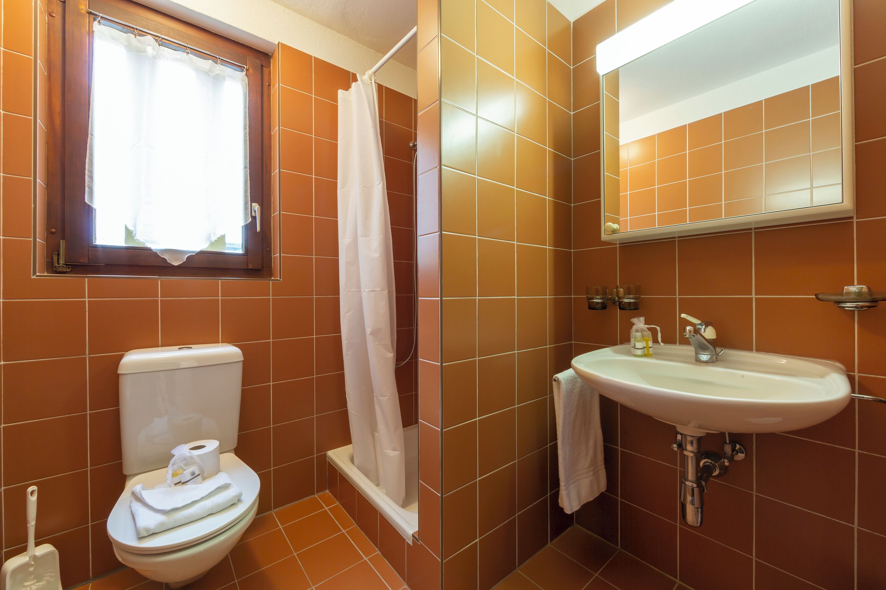 Family Apartment, Multiple Bedrooms (Casa Chiara) | Bathroom | Shower, rainfall showerhead, towels, soap