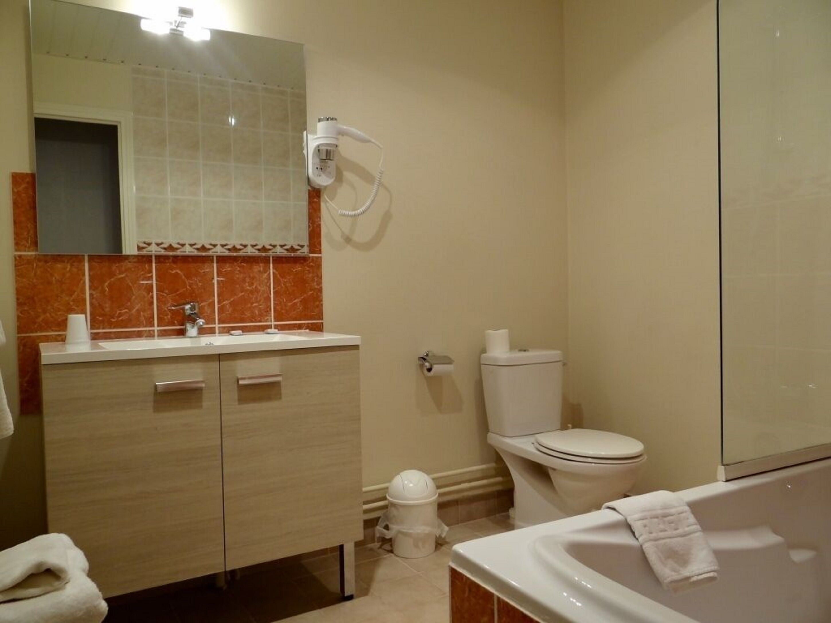 family room | bathroom | hair dryer, towels