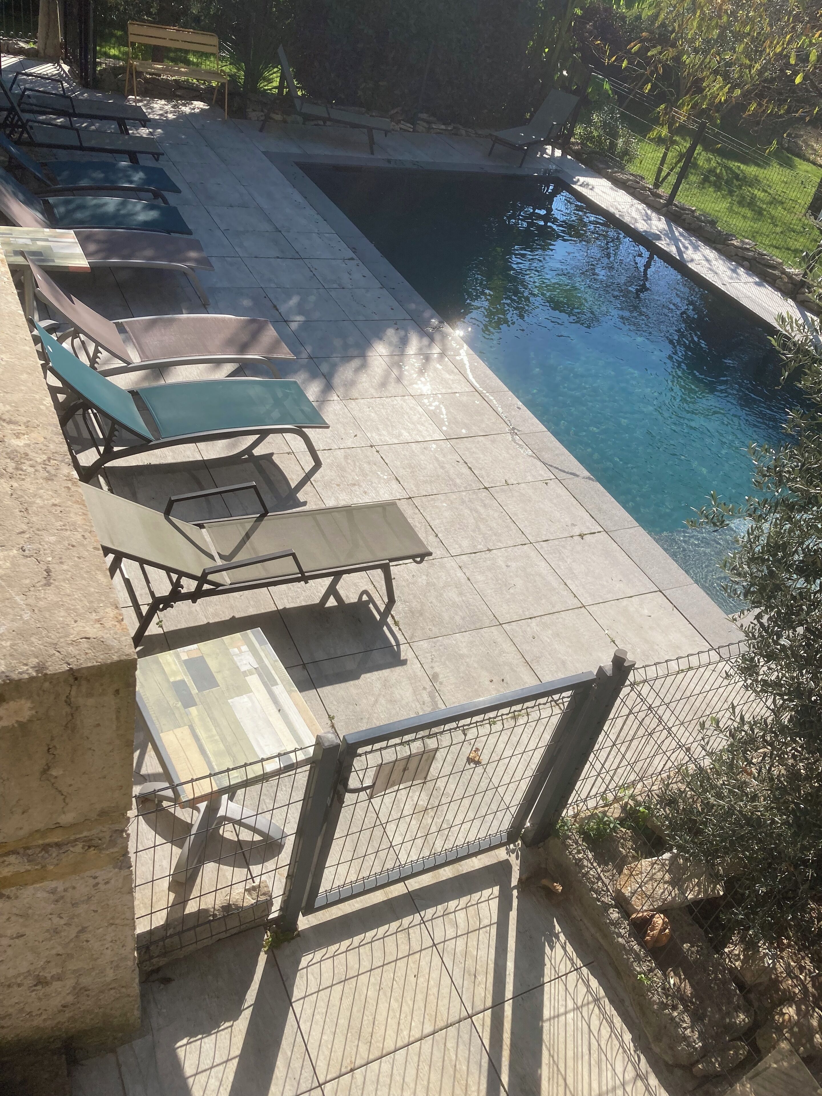 Seasonal outdoor pool, open 9:00 AM to 8:00 PM, pool umbrellas