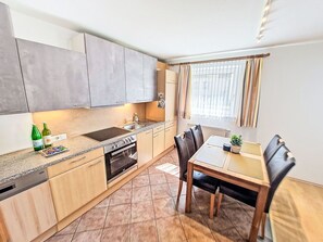 Oven, dishwasher, freezer, dining tables