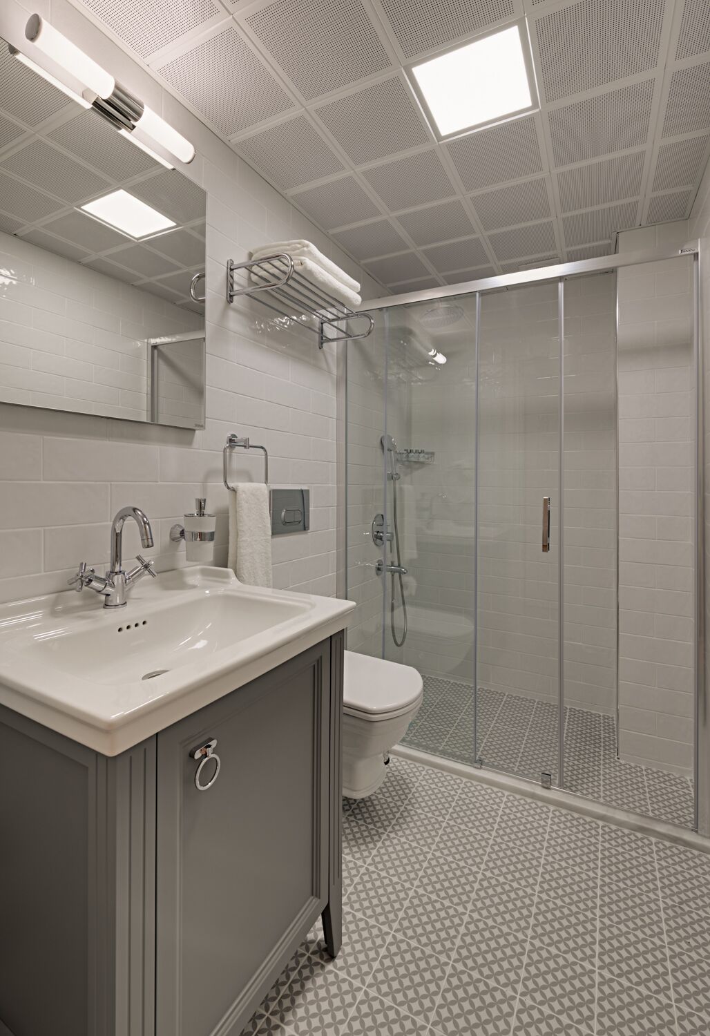 shower, hair dryer, slippers, towels