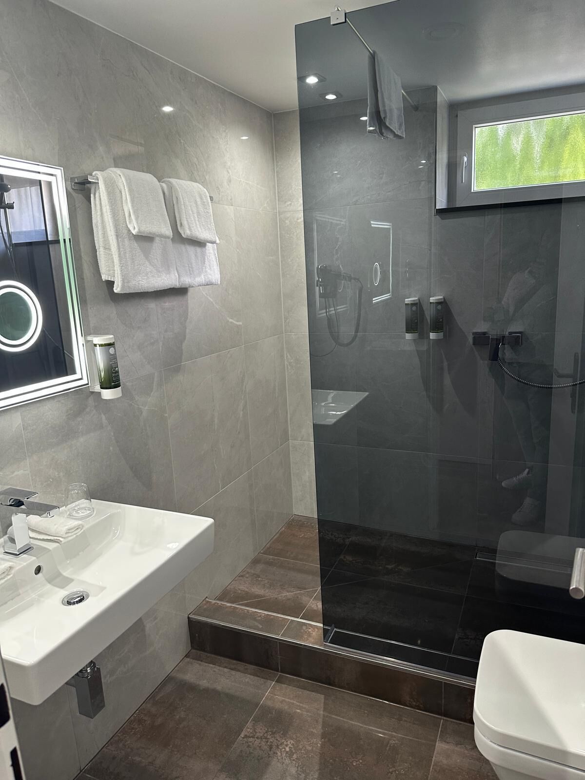 hair dryer, towels, soap, shampoo