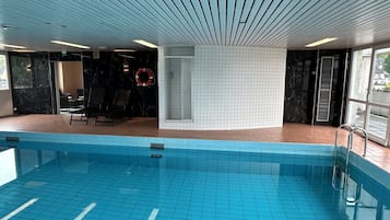 Indoor pool, open 7:00 AM to 10:00 PM, sun loungers