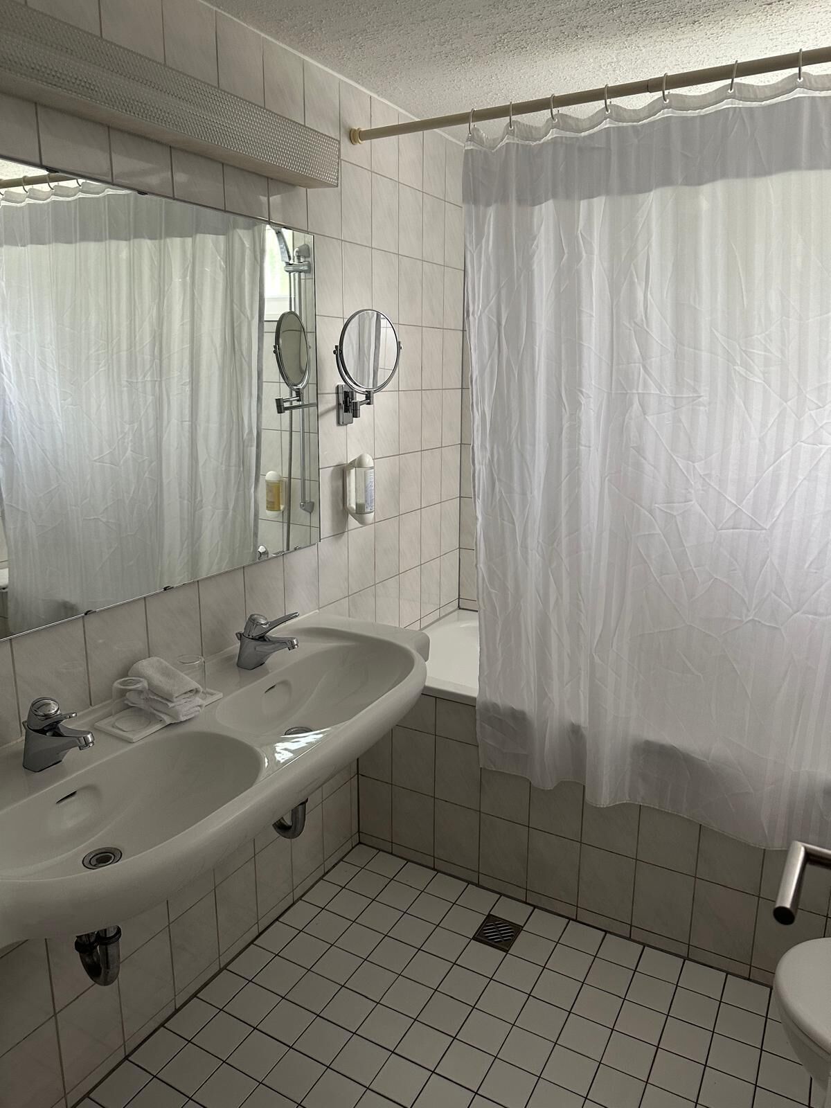 hair dryer, towels, soap, shampoo