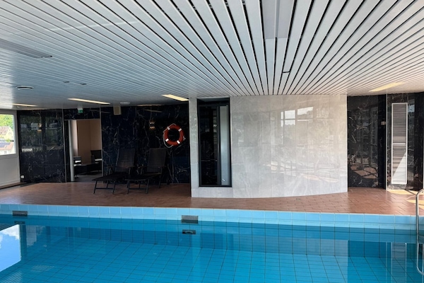 Indoor pool, open 7:00 AM to 10:00 PM, sun loungers
