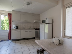 Apartment | Private kitchen | Microwave, stovetop, highchair