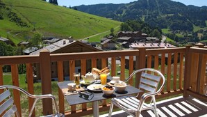 Apartment | Balcony - Chic Chalet-style Apartment (La Clusaz)